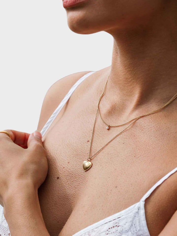 AMOUR | COLLAR CON CORAZÓN ESCULPIDO Y CADENA DE CUENTAS