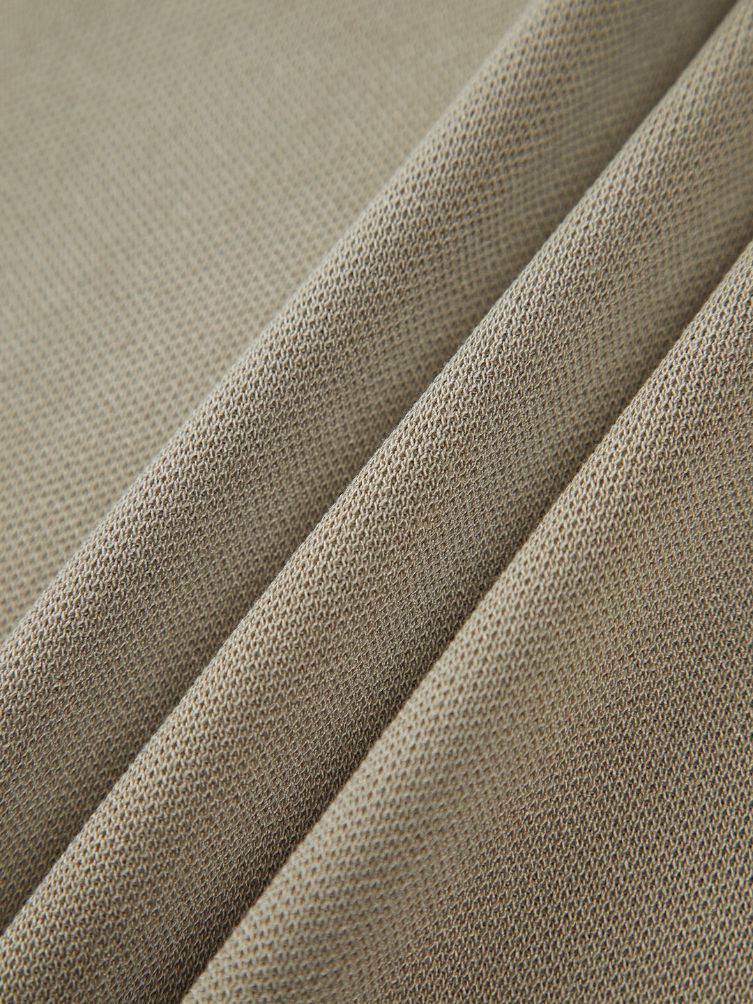 ÁNGELA | TOP DE PUNTO SIN MANGAS CON CUELLO ALTO