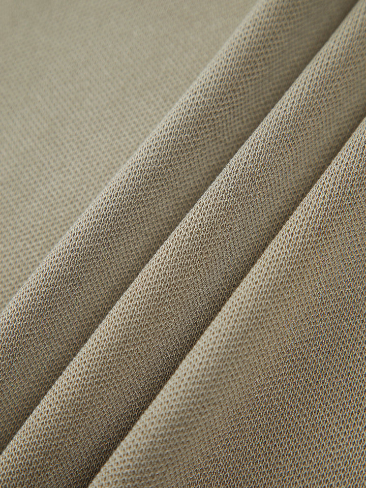 ÁNGELA | TOP DE PUNTO SIN MANGAS CON CUELLO ALTO