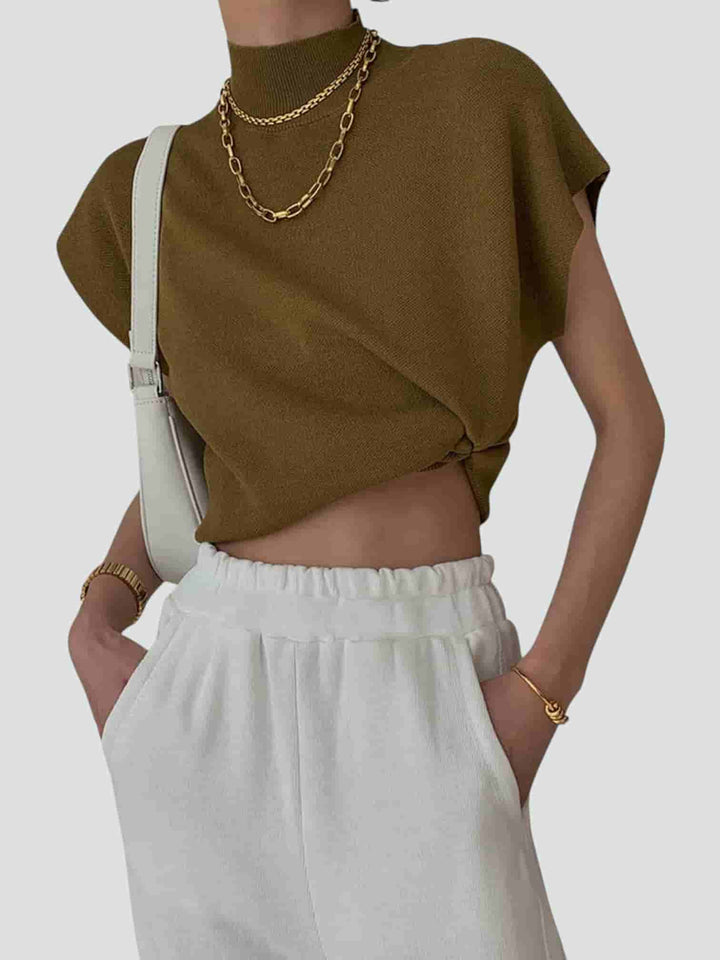 ÁNGELA | TOP DE PUNTO SIN MANGAS CON CUELLO ALTO