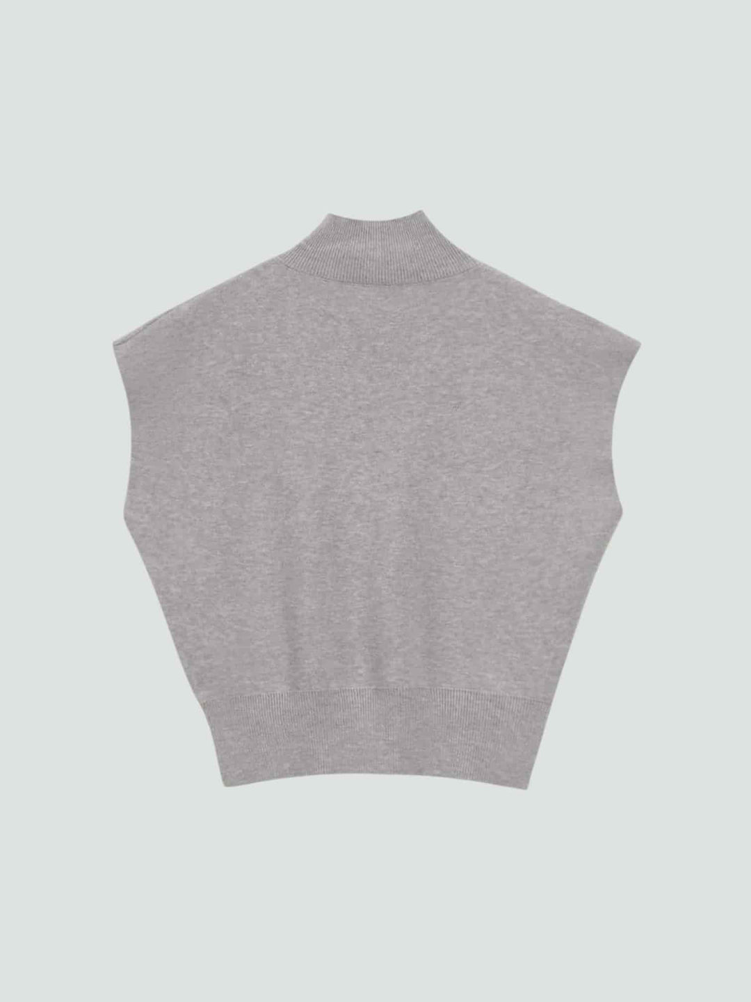 ÁNGELA | TOP DE PUNTO SIN MANGAS CON CUELLO ALTO