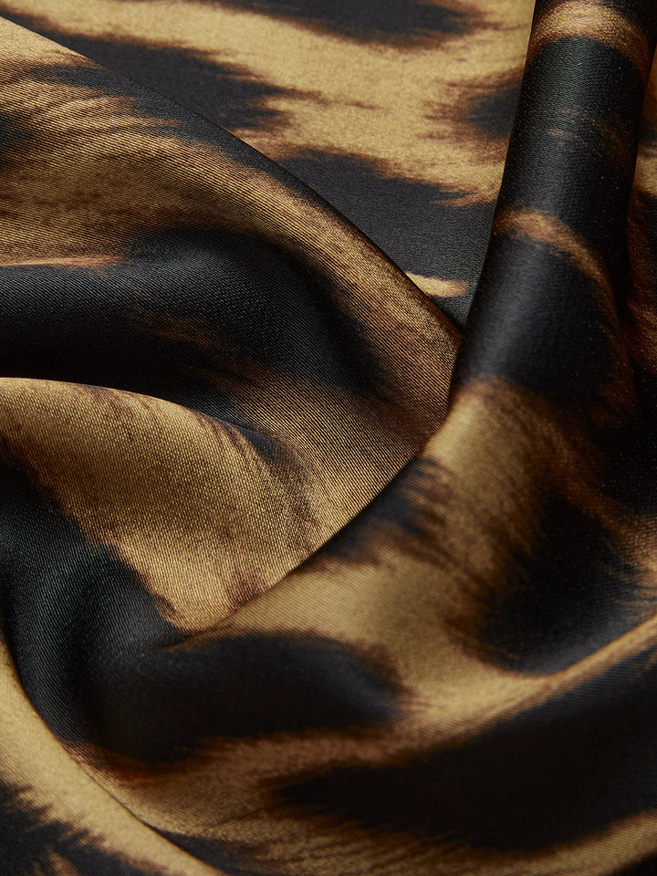 VERÓNICA | FALDA MIDI SATINADA ANIMAL PRINT