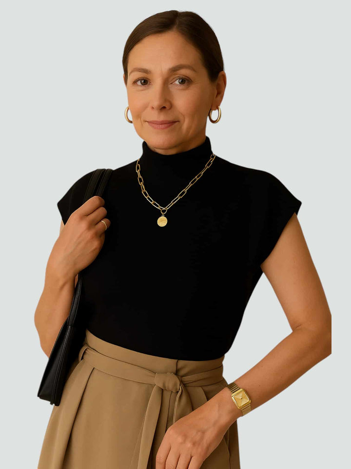 ÁNGELA | TOP DE PUNTO SIN MANGAS CON CUELLO ALTO