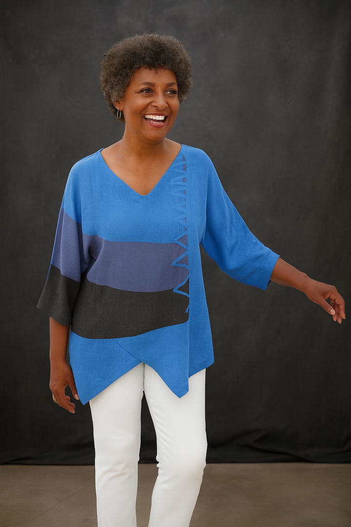 VANESA | BLUSA FLORAL CON CORTE RELAJADO Y DETALLES FEMENINOS