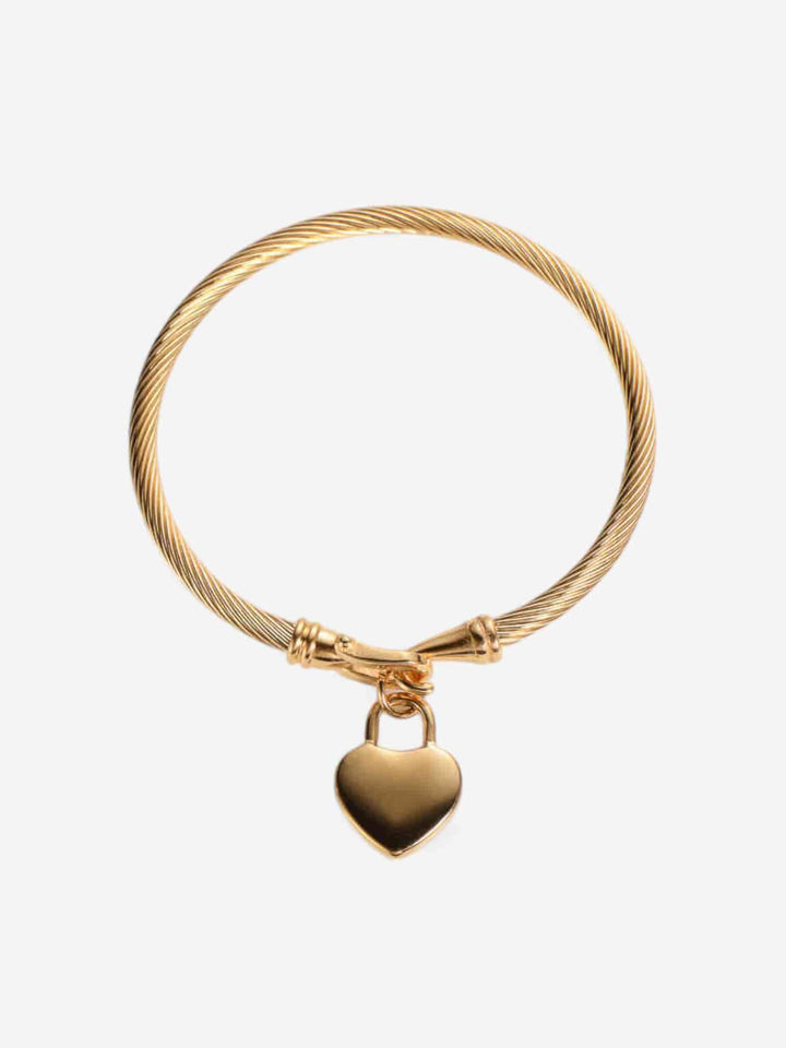 AMOUR CABLE | PULSERA CON DISEÑO ENROLLADO Y DIJE DE CORAZÓN