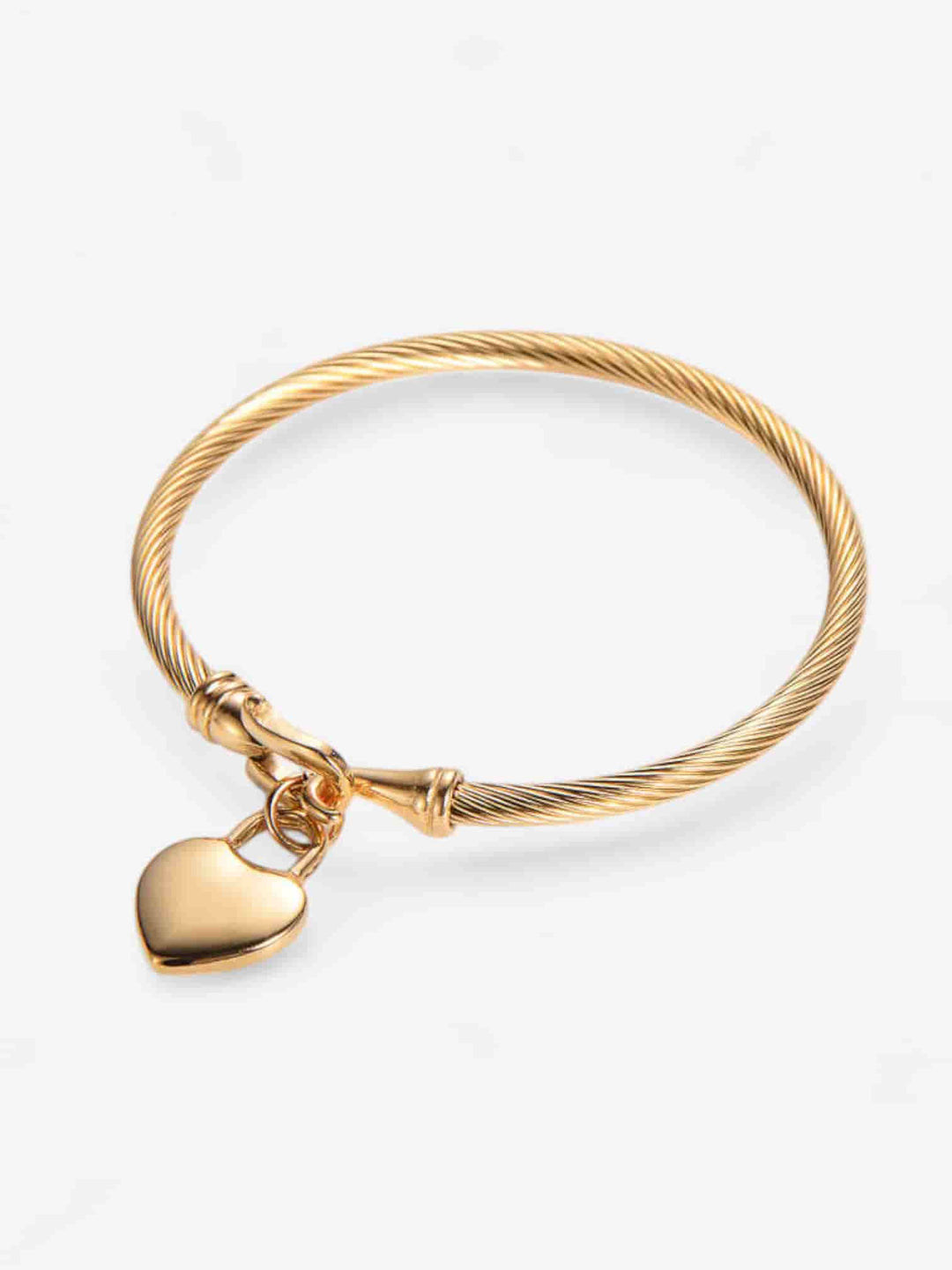 AMOUR CABLE | PULSERA CON DISEÑO ENROLLADO Y DIJE DE CORAZÓN