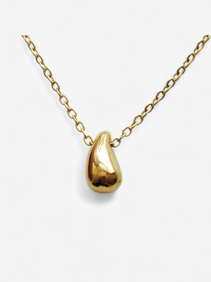SOLEIL DROP | COLLAR CON COLGANTE DORADO Y FUERZA SILENCIOSA