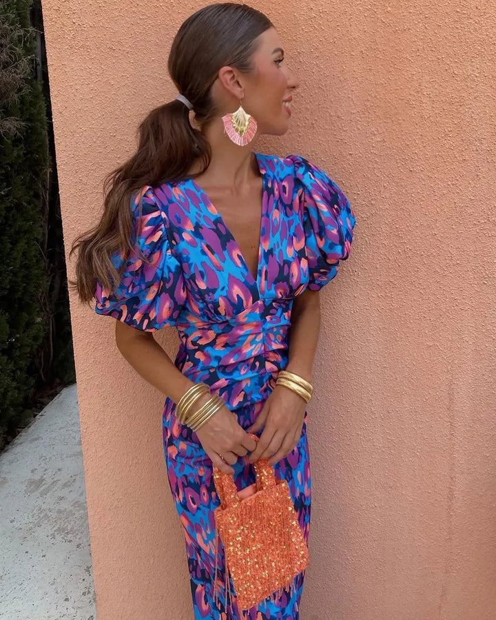 SIMONA |  Elegante vestido de dama con escote en V y mangas abullonadas